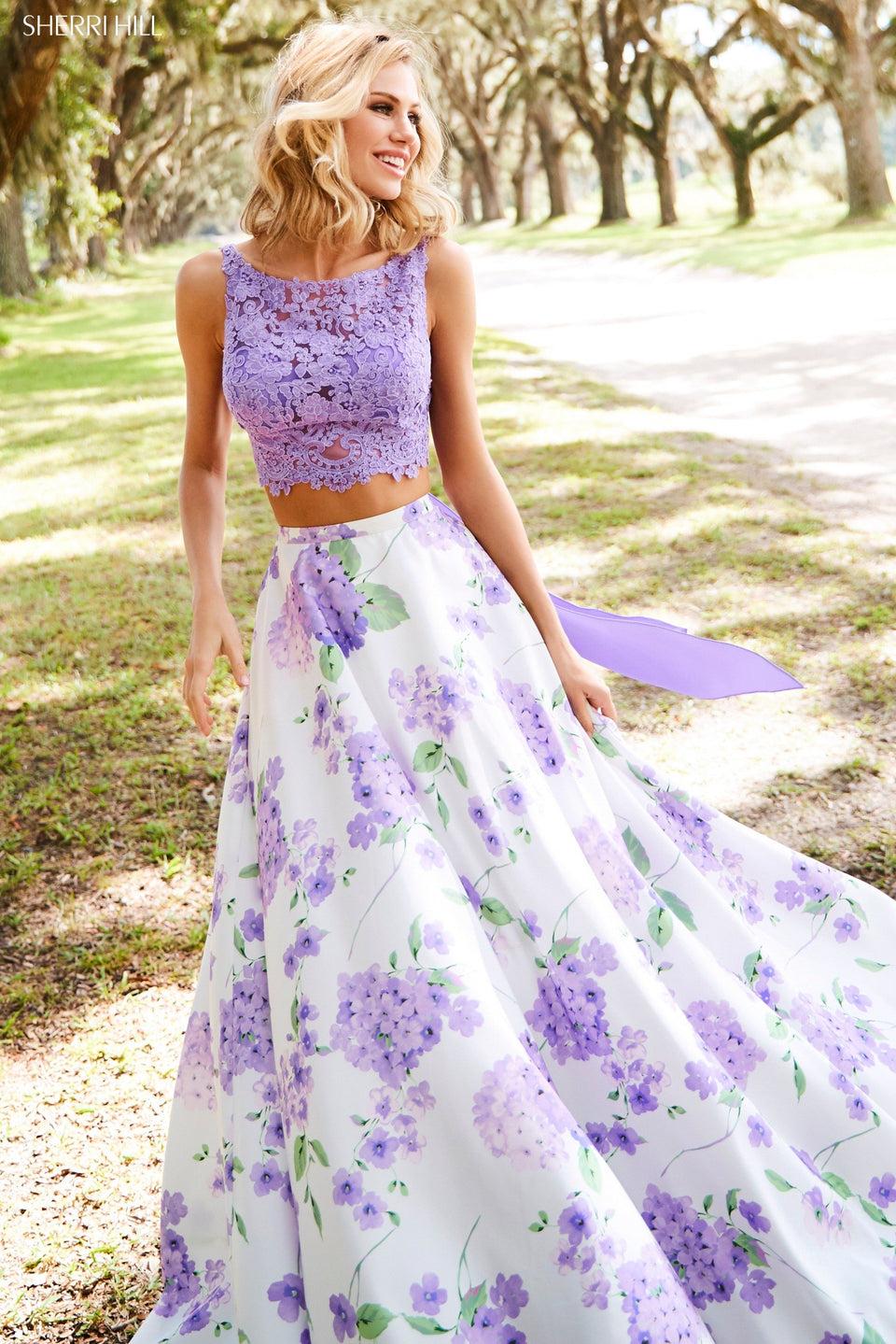 sherri hill Two-piece taffeta ball gown with floral printed skirt and a lace top with a tie back