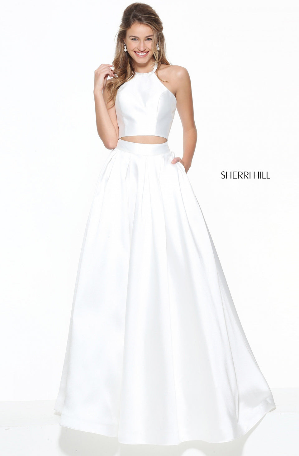 sherri hill Two piece with a high neck halter style bodice and box pleated ball gown skirt