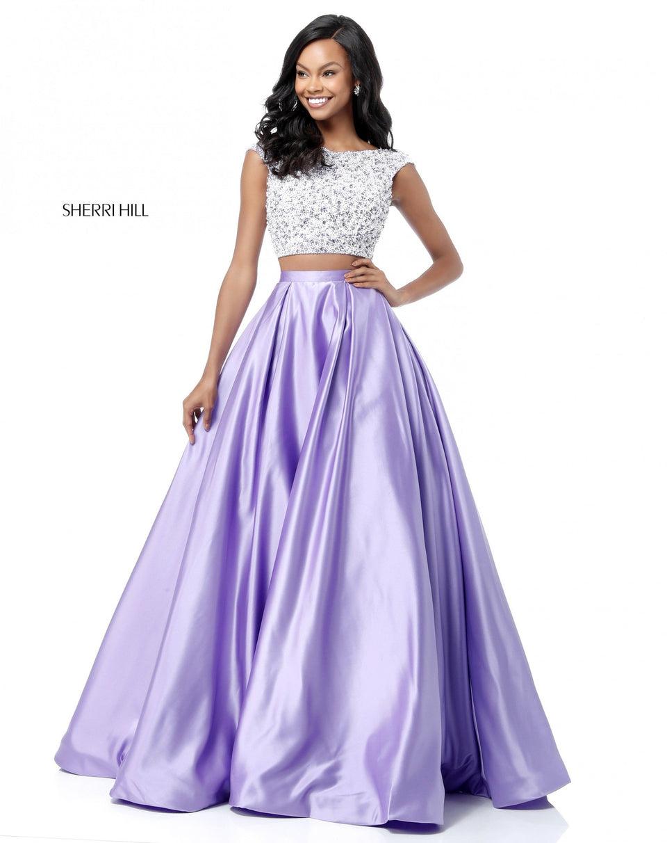 sherri hill Two piece with beaded and pearl encrusted bodice with a cut out in the back and a satin ball gown skirt