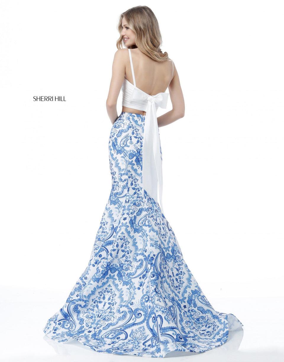Sherri Hill Two Piece With Front Cross Sweetheart Bodice With A Bow In The Back And A Blue Ivory Print Mermaid Skirt