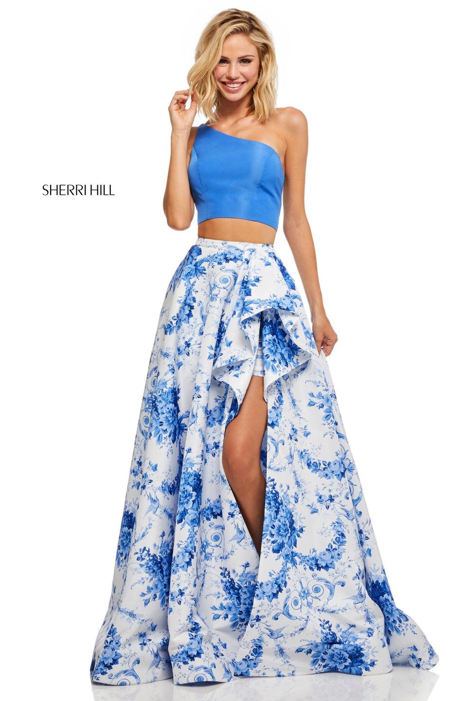 sherri hill Two-piece with ivory blue print A-line skirt with a ruffled front slit and one-shoulder bodice