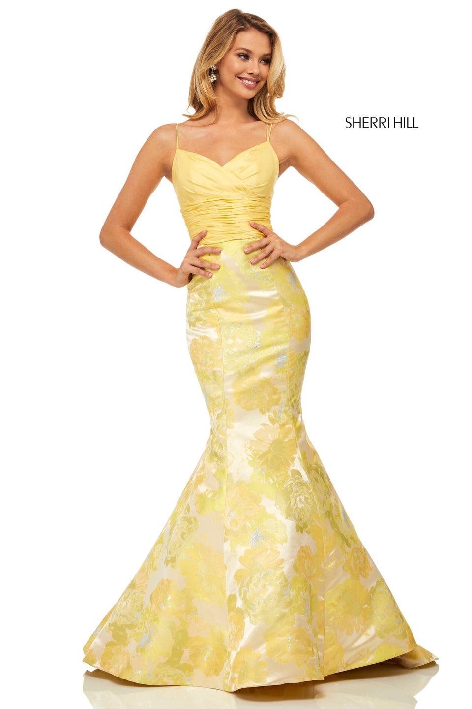 sherri hill Yellow brocade mermaid with ruched taffeta bodice and bow back