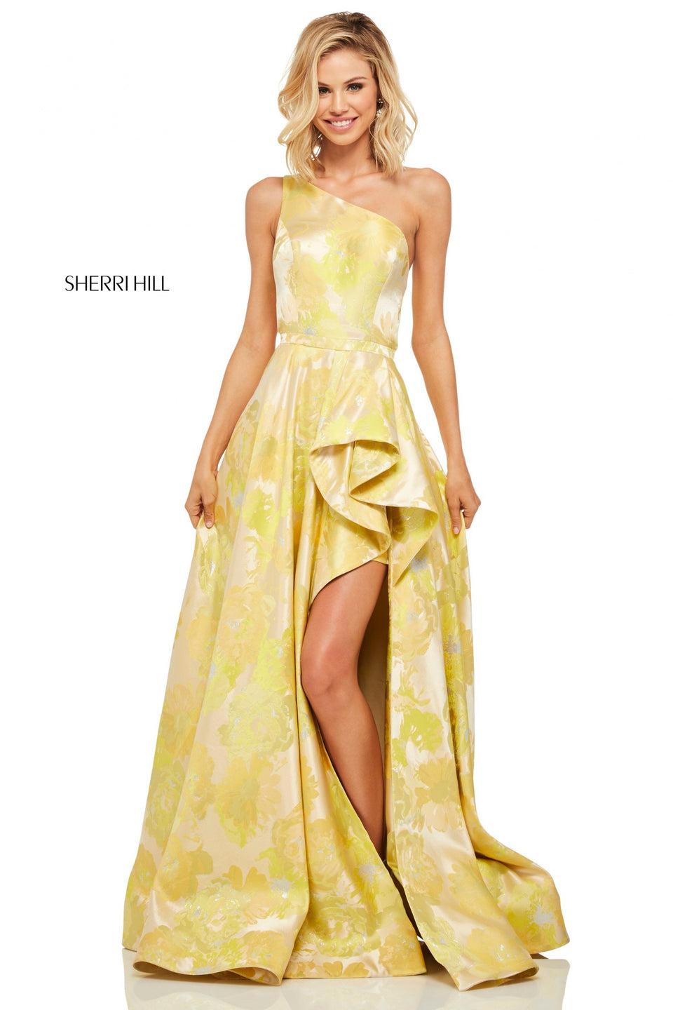 sherri hill Yellow brocade one shoulder gown with a ruffle front slit and cut out back