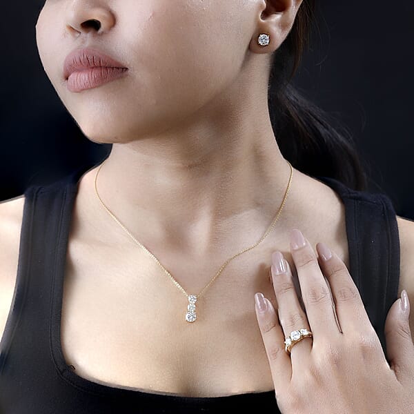 Shop Lc 120 Facet Moissanite (Rnd 6.5mm) Trilogy Ring Pendant Without Chain And Stud Earrings Jewelry Set For Women In Vermeil YG Over Sterling Silver 6.20 Ctw