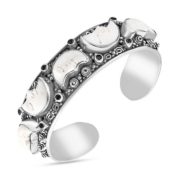 Shop Lc Bali Legacy Carved Bone And Blue Topaz 1.20 Ctw Moon Cuff Bracelet In Sterling Silver (8.00In)