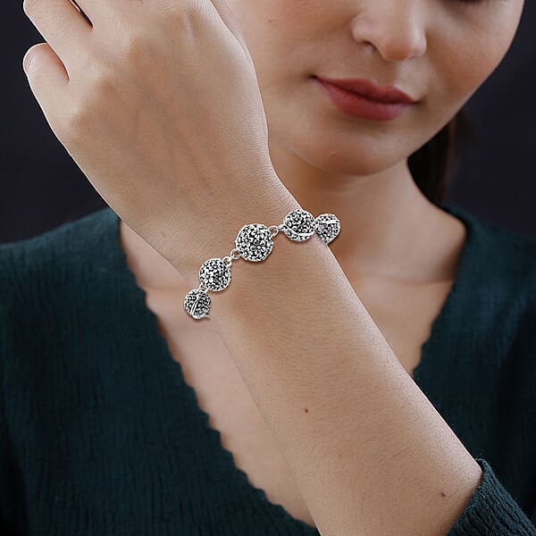 Shop Lc Bali Legacy Round Filigree Frangipani Floral Toggle Clasp Bracelet In Sterling Silver (6.50-8.0In) 18.30 Grams