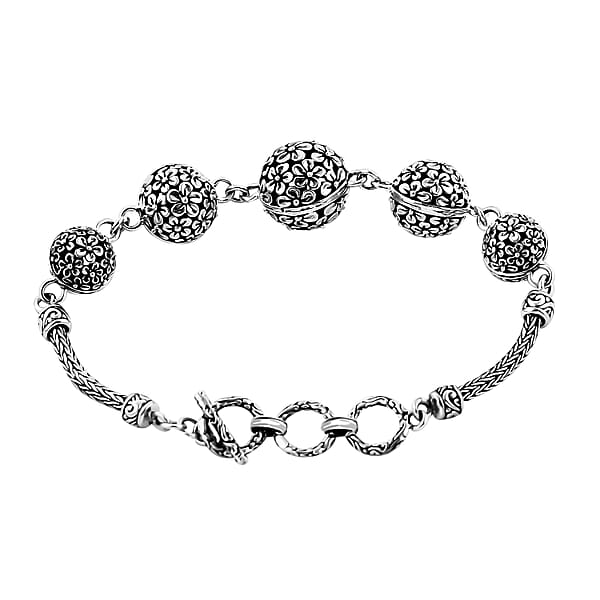 Shop Lc Bali Legacy Round Filigree Frangipani Floral Toggle Clasp Bracelet In Sterling Silver (6.50-8.0In) 18.30 Grams