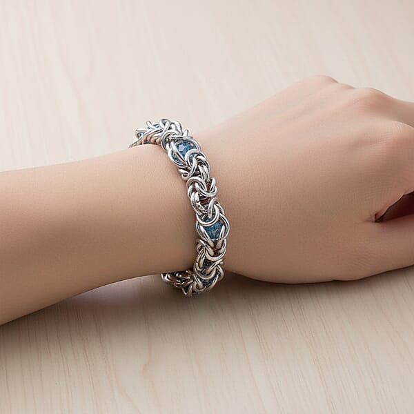 Shop Lc Blue Magic Color Glass Interlock Weave Chain Bracelet In Stainless Steel (8-10In)