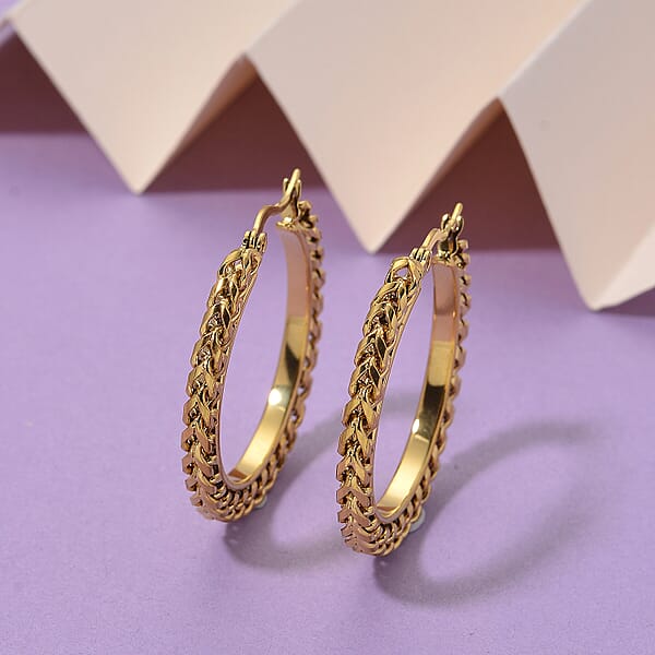 Shop Lc Criss Cross Hoop Earrings In ION Plated YG Stainless Steel