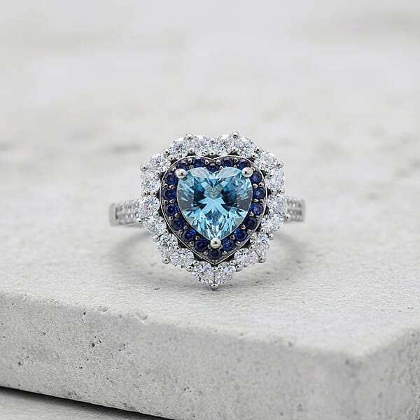 Shop Lc D'Joy Blue And White Moissanite And Blue Sapphire 3.10 Ctw Crowned Heart Glow Ring In Rhodium Over Sterling Silver