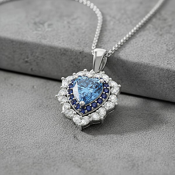 Shop Lc D'Joy Blue And White Moissanite And Blue Sapphire 3.00 Ctw Crowned Heart Glow Pendant Necklace In Rhodium Over Sterling Silver 18 Inches