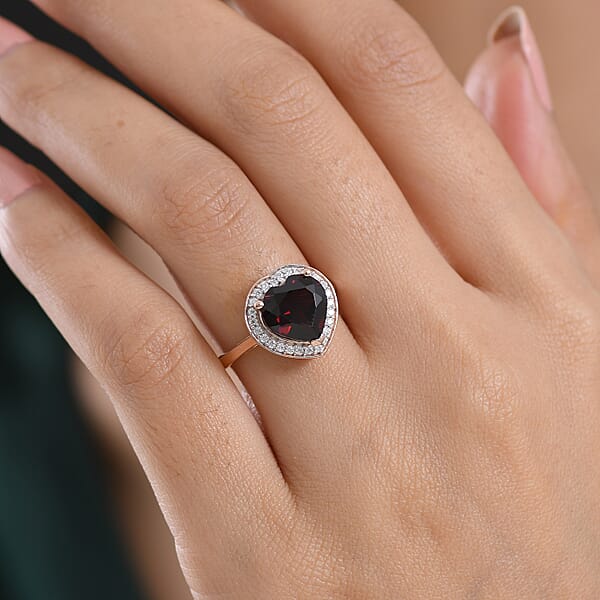 Shop Lc D'Joy Mozambique Garnet And Moissanite 3.90 Ctw Heartfire Glow Ring In 18K Vermeil Rose Gold Over Sterling Silver