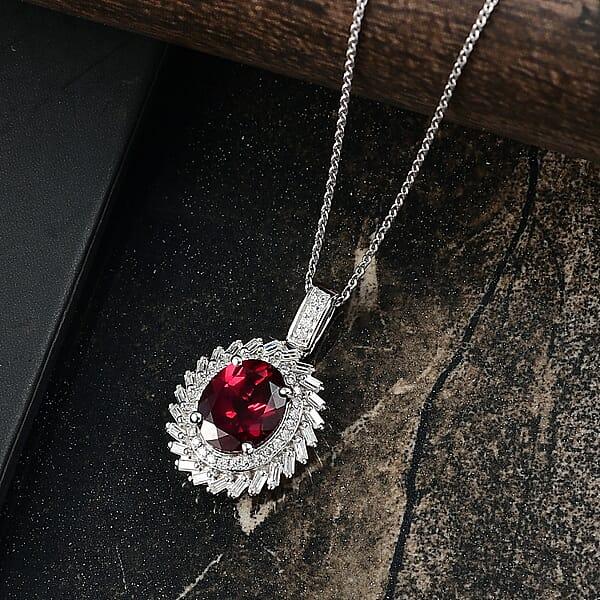 Shop Lc D'Joy Orissa Rhodolite Garnet Moissanite Starburst Pendant Necklace In Rhodium Over Sterling Silver 11.10 Ctw (20 Inches)
