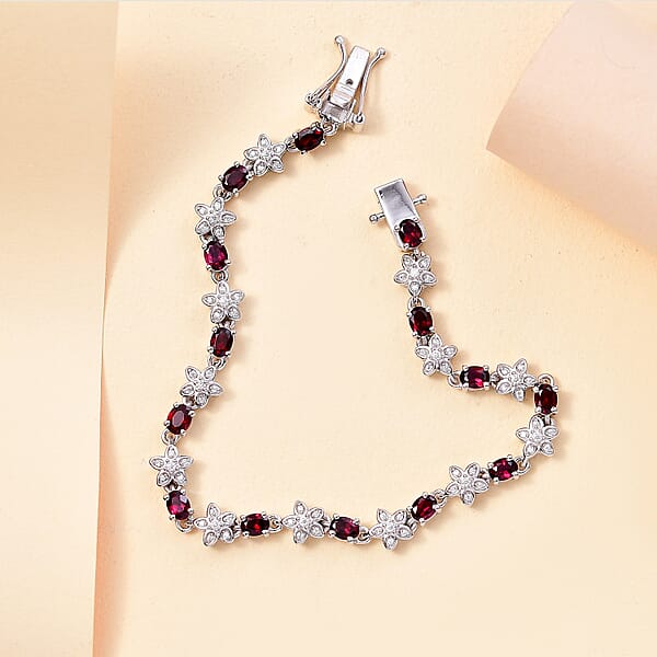 Shop Lc D'Joy Premium Anthill Garnet And Moissanite 6.00 Ctw Flower Bracelet In Rhodium Over Sterling Silver (8.00 In)