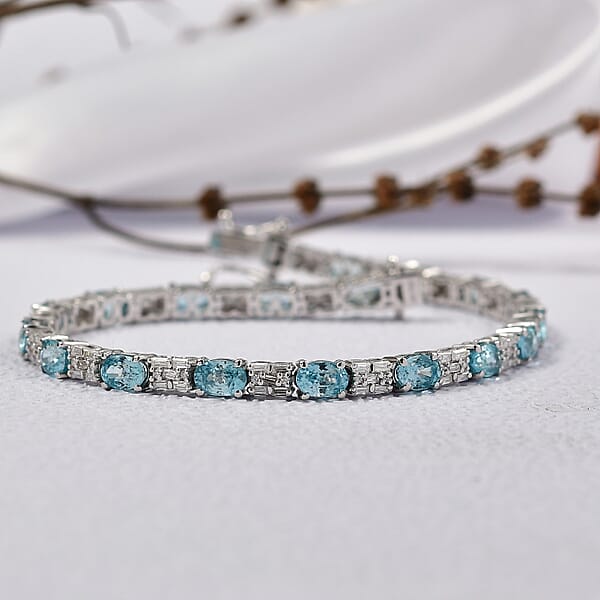 Shop Lc D'Joy Premium Cambodian Blue Zircon And Moissanite 12.85 Ctw Floral Blue Vines Bracelet In Rhodium Over Sterling Silver (6.50 In)