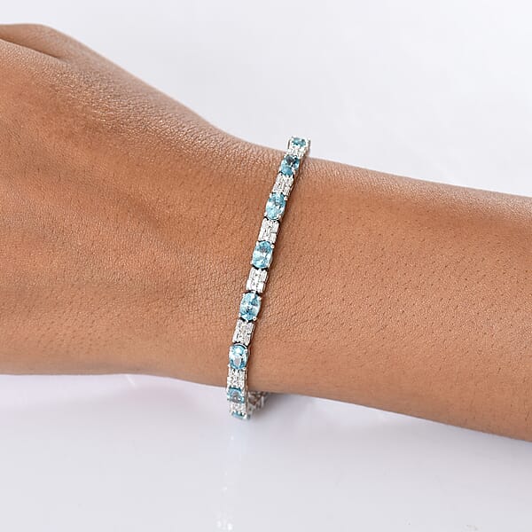 Shop Lc D'Joy Premium Cambodian Blue Zircon And Moissanite 12.85 Ctw Floral Blue Vines Bracelet In Rhodium Over Sterling Silver (6.50 In)
