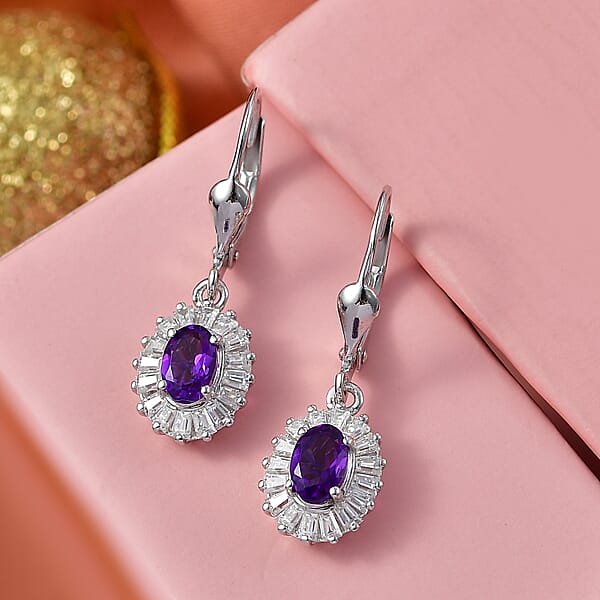 Shop Lc D'Joy Premium Lusaka Amethyst And Moissanite 1.65 Ctw Sunray Bloom Earrings In Rhodium Over Sterling Silver