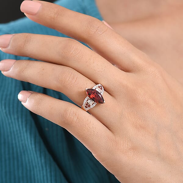 Shop Lc D'Joy Premium Mozambique Garnet And Moissanite 3.20 Ctw Deco Flame Ring In 18K Vermeil Rose Gold Over Sterling Silver
