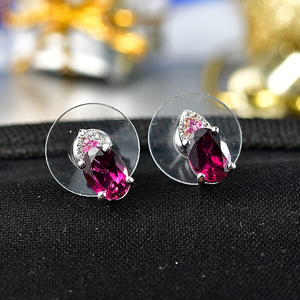 Shop Lc D'Joy Radiant Ember Garnet And Multi Gemstone 2.10 Ctw Infinity Earrings In Rhodium Over Sterling Silver