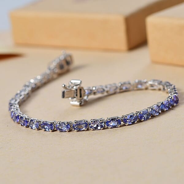 Shop Lc D'Joy Tanzanite 6.15 Ctw Tennis Bracelet In Rhodium Over Sterling Silver (7.25 In)