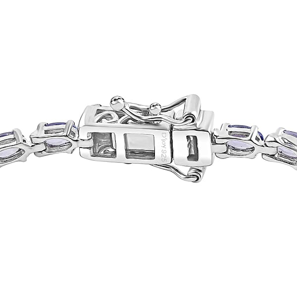 Shop Lc D'Joy Tanzanite 6.15 Ctw Tennis Bracelet In Rhodium Over Sterling Silver (7.25 In)