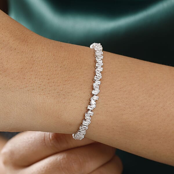 Shop Lc D'Joy White Zircon 8.20 Ctw Waves Bracelet In Rhodium Over Sterling Silver (7.25 In)
