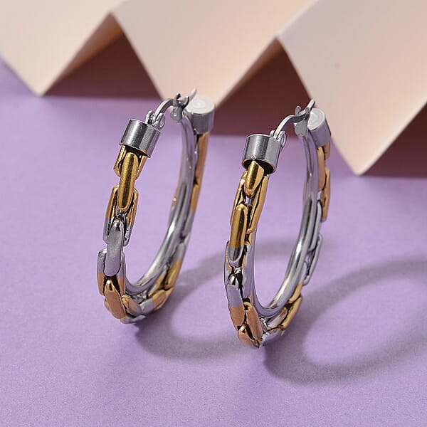 Shop Lc Hammered Hoop Earrings In ION Plated YG Stainless Steel