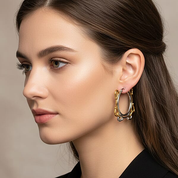 Shop Lc Modern Wave Link Hoop Earrings In ION Plated YG And Stainless Steel