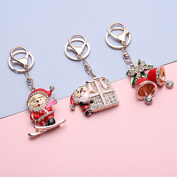 Shop Lc Set Of 3 Multi Color Austrian Crystal Enameled Skiing Santa Jingle Bells & Christmas Present Keychain In Rosetone