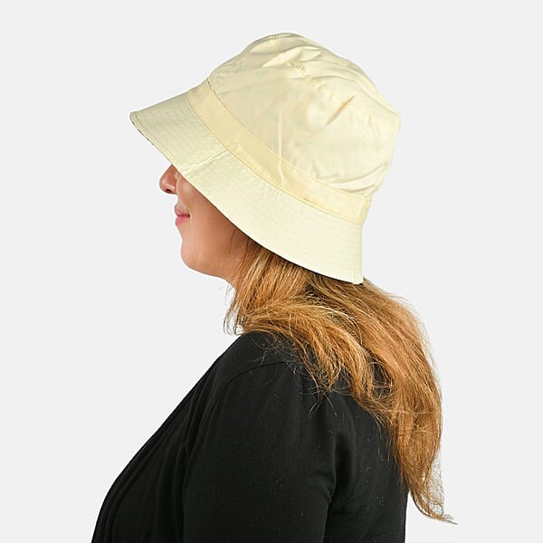 Shop Lc ShedRain Cream And Orange Floral Reversible Bucket Hat