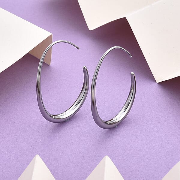 Shop Lc Curved Hoop Earrings In Stainless Steel