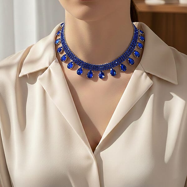 Shop Lc Sparkling Blue Austrian Crystal Dripping Necklace (16-19 Inches) In Silvertone