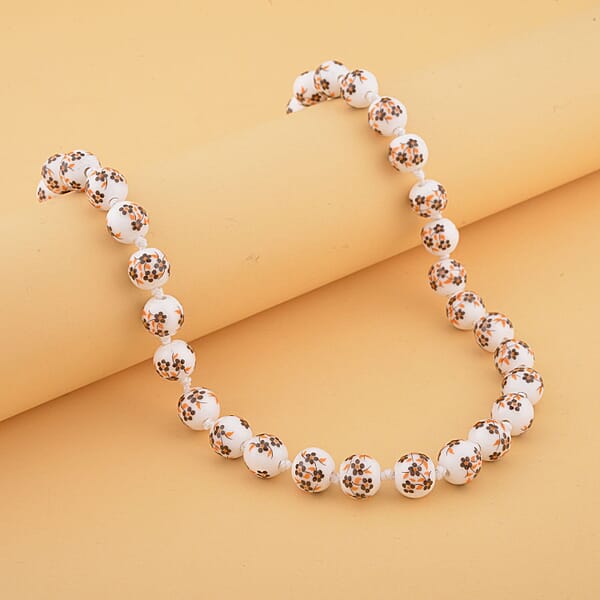 Shop Lc Yellow Flower Ceramic Beaded Knotted Necklace In Silvertone 20 Inches