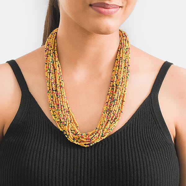 Shop Lc Yellow Seed Beaded Multi Layered Necklace 20-22 Inches In Goldtone