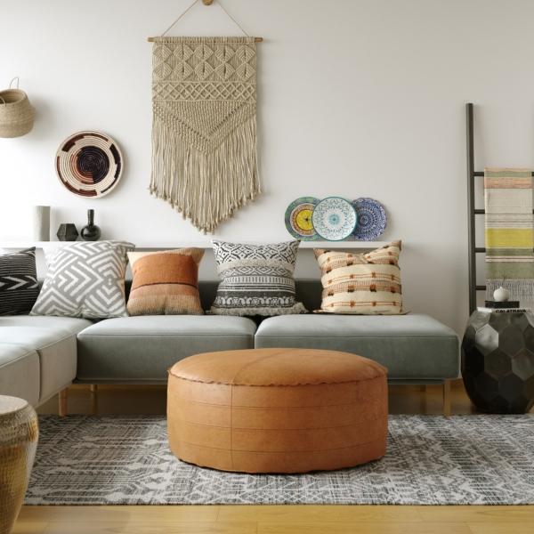 signature design by ashley Simpli Home Brody Round Ottoman in Distressed Faux Leather