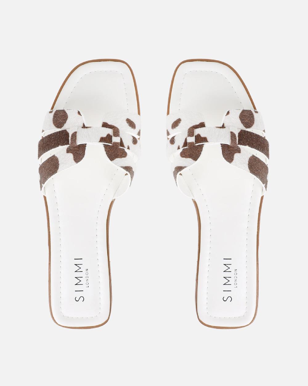 Simmi Cow Print Slip On Flat Sandals