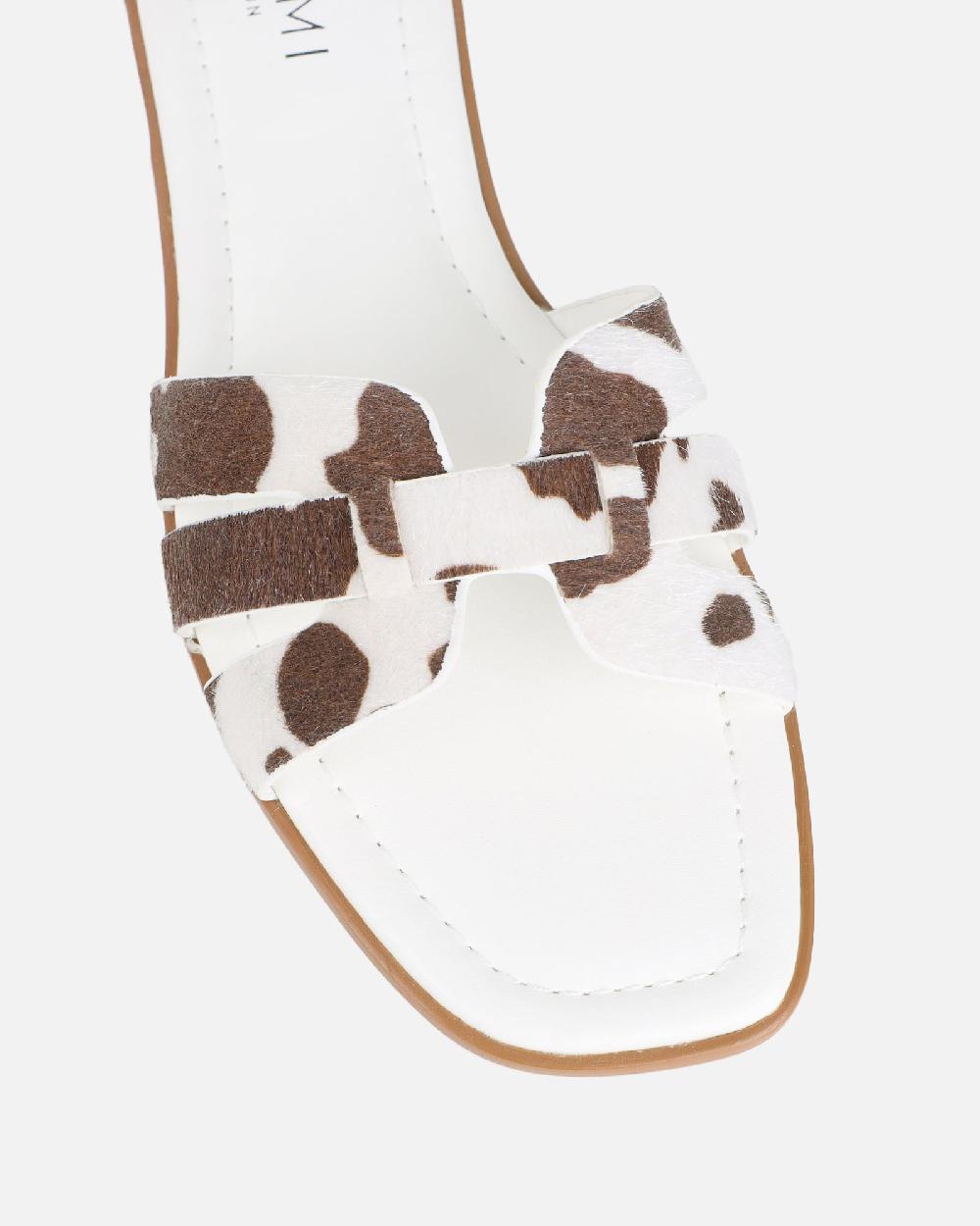Simmi Cow Print Slip On Flat Sandals