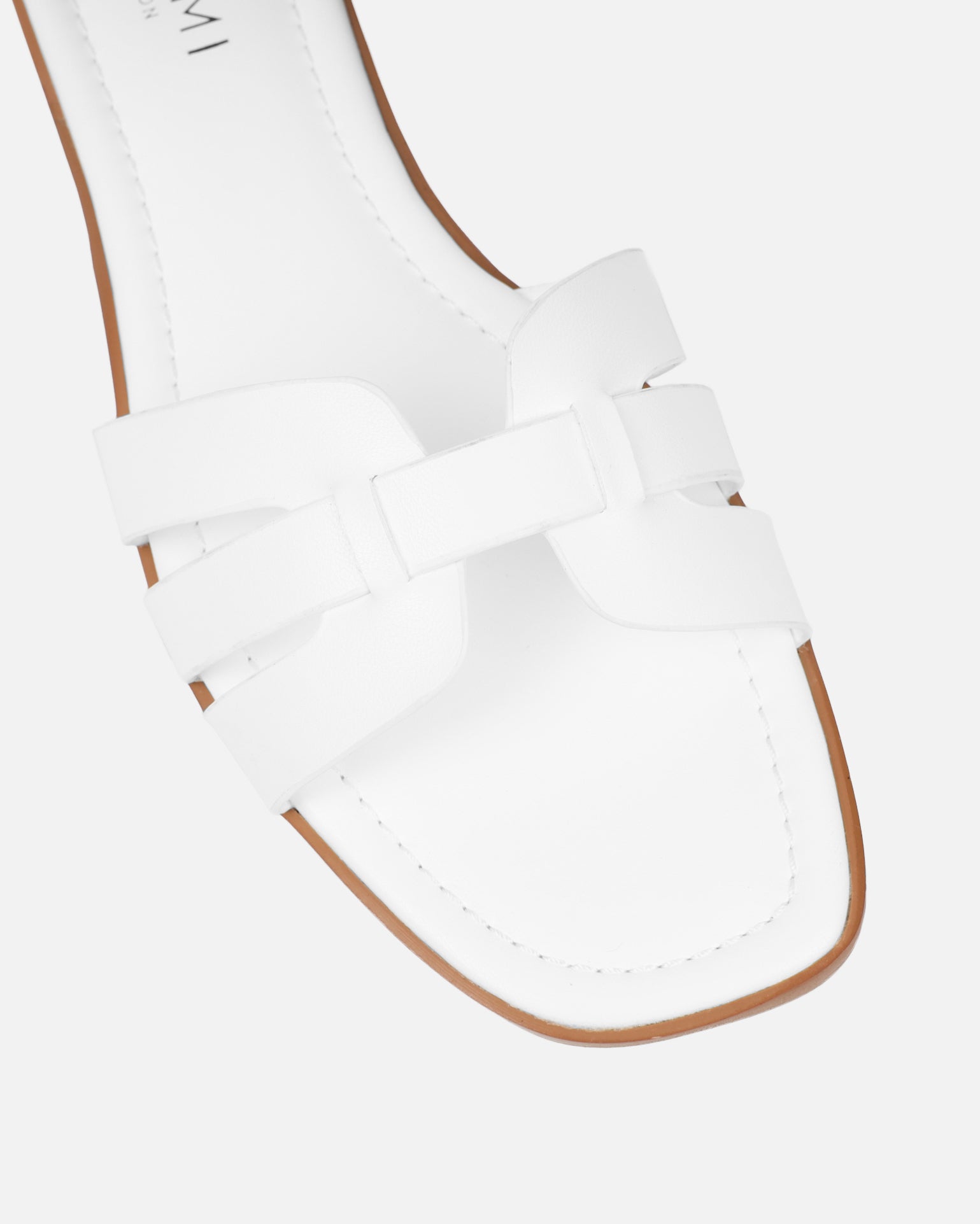Simmi White Slip On Flat Sandals