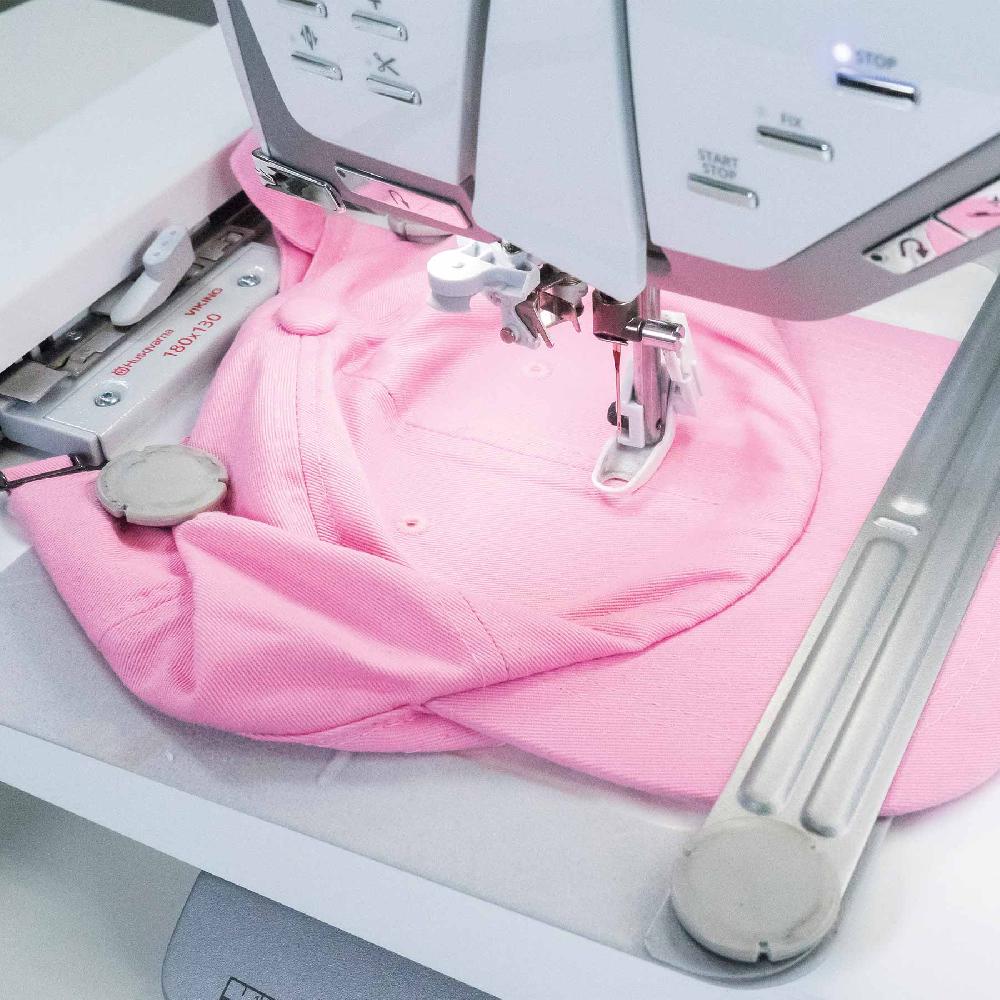 Singer HUSQVARNA® VIKING® DESIGNER TOPAZ™ 40 Sewing & Embroidery Machine Bundle