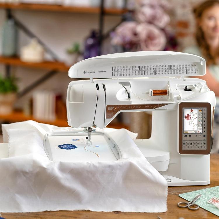 singer HUSQVARNA® VIKING® DESIGNER TOPAZ™ 40 Sewing & Embroidery Machine Bundle