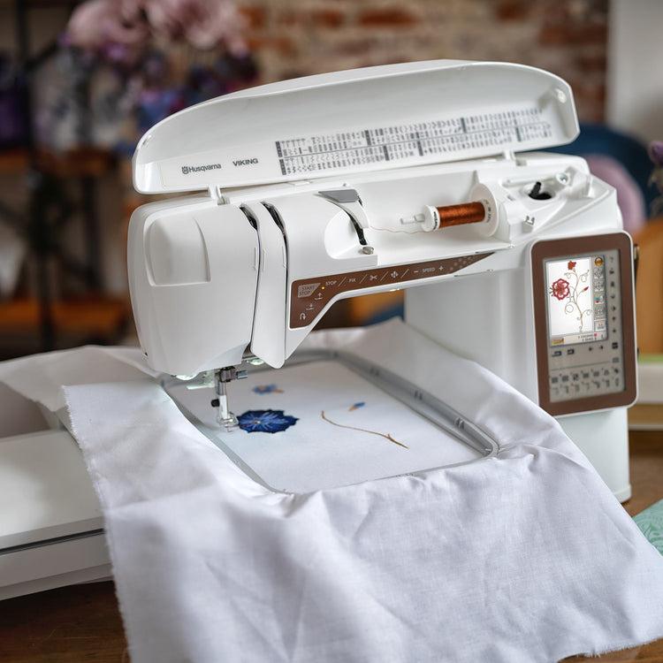 singer HUSQVARNA® VIKING® DESIGNER TOPAZ™ 40 Sewing & Embroidery Machine