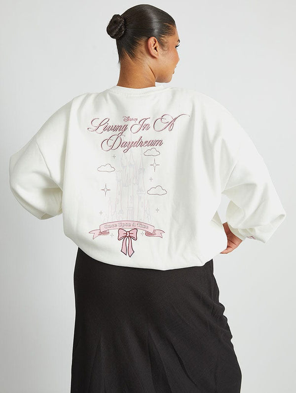 Skinnydip London Disney Living In A Daydream Sweatshirt in Ecru Skinnydip London Disney Living In A Daydream Sweatshirt in Ecru