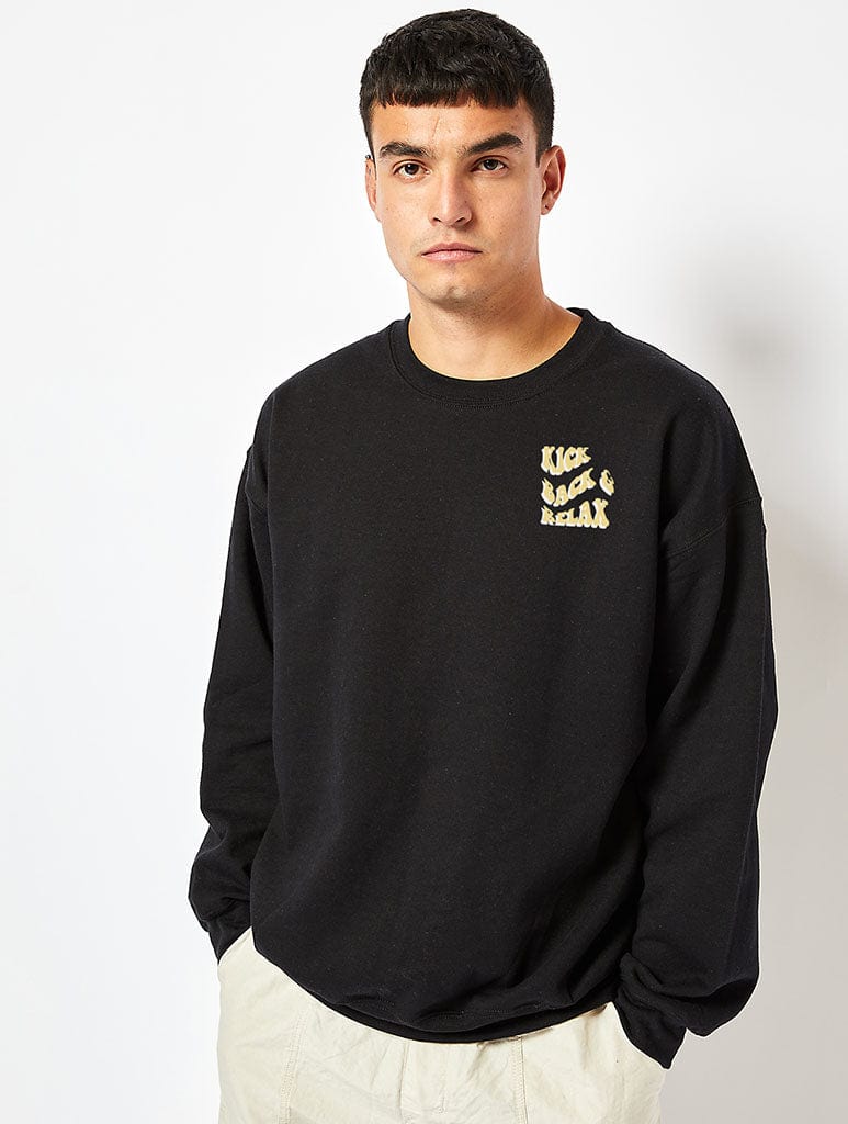 Skinnydip London Peanuts X Skinnydip Kick Back & Relax Sweatshirt In Black