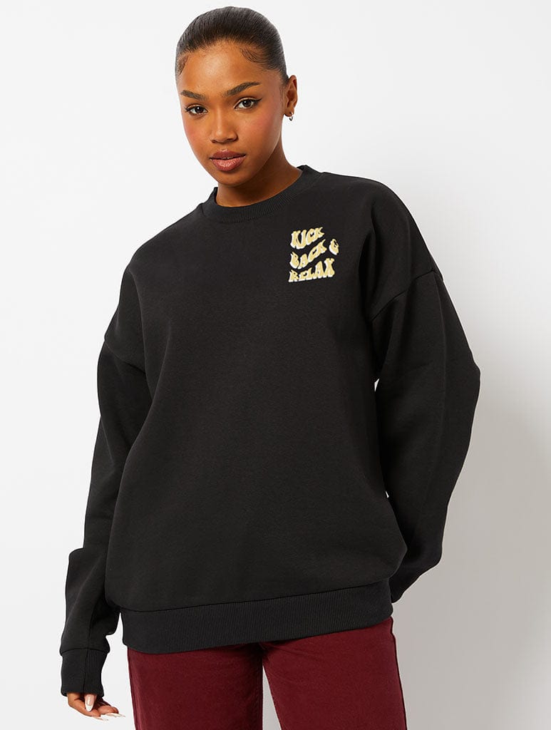 Skinnydip London Peanuts X Skinnydip Snoopy Kick Back & Relax Sweatshirt In Black
