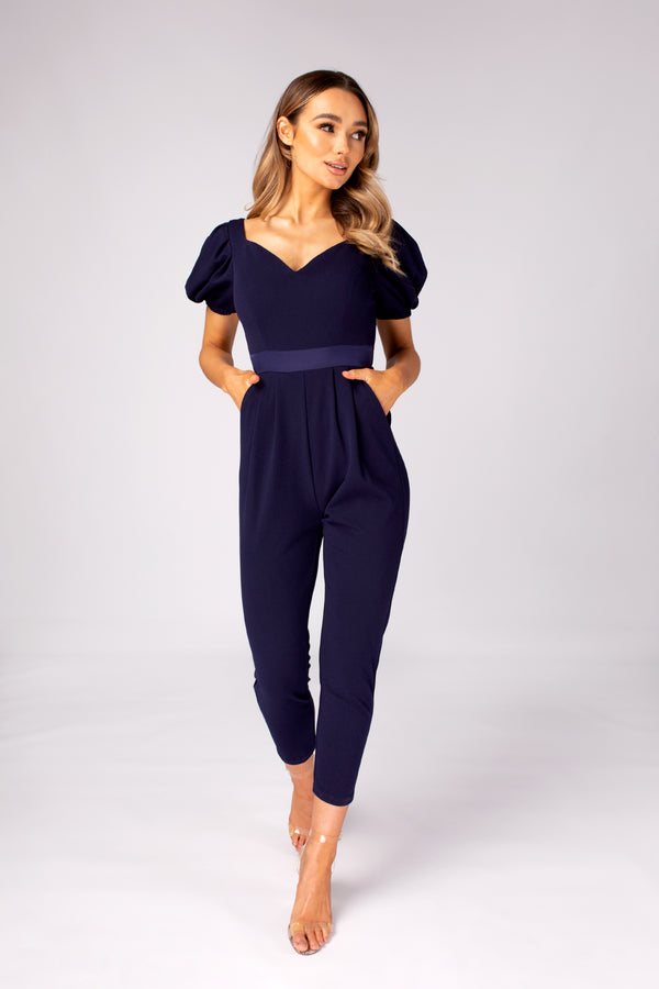 Skirt & Stiletto Navy Jumpsuit With Puff Sleeve And Back Tie