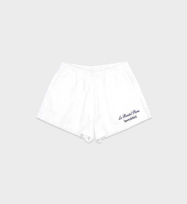 sporty & rich Faubourg Disco Short - White/Navy
