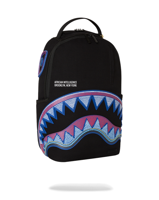 Sprayground A.I. AFRICAN INTELLIGENCE BORN AND RAISED BACKPACK - SANDFLOWER COLLAB