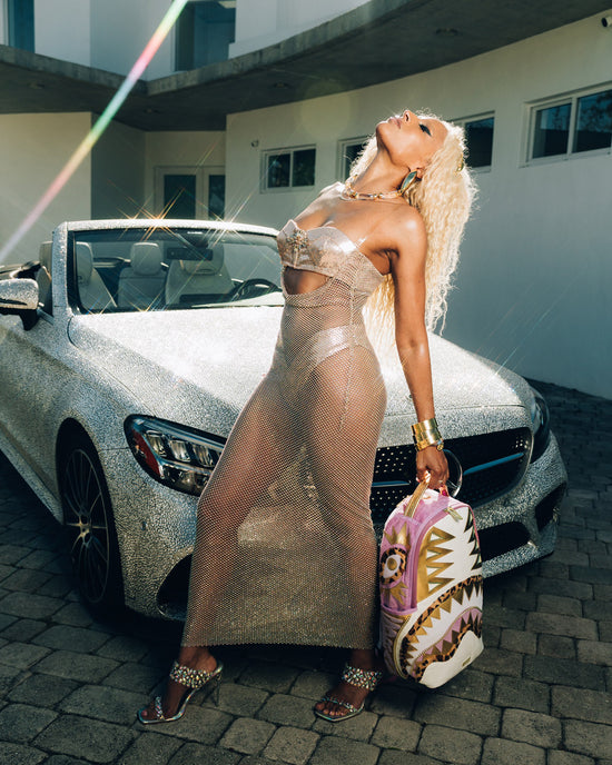 Sprayground A.I. AFRICAN INTELLIGENCE PARADIGM OF THE PYRAMID BACKPACK - SANDFLOWER COLLAB