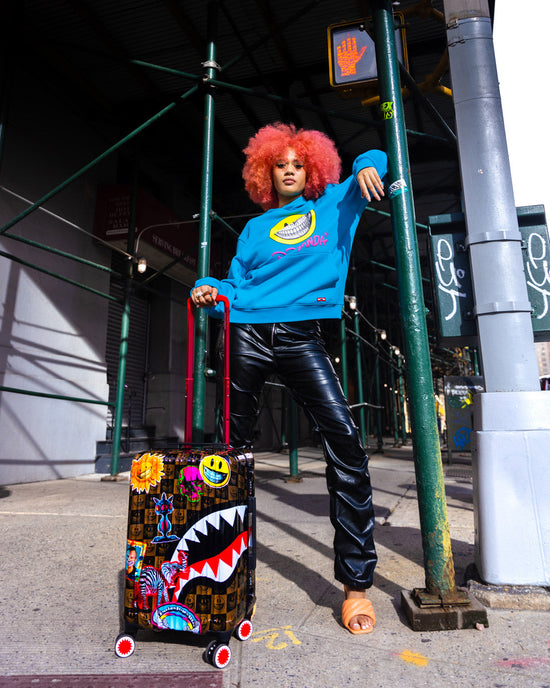 Sprayground GLOBAL MOGUL POPAGANDA RON ENGLISH EDITION HARDSHELL CARRY-ON LUGGAGE