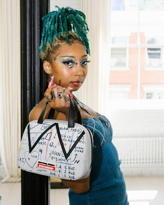 Sprayground OFFICIAL BASQUIAT UNTITLED (CHEESE POPCORN) 1983 HANDBAG